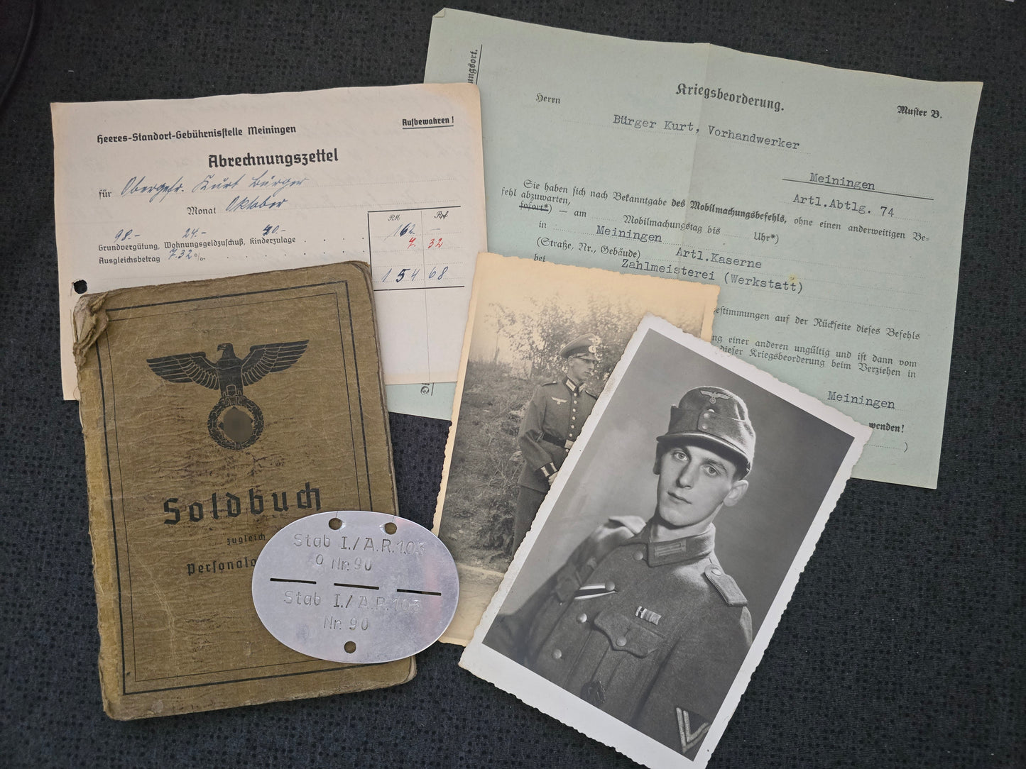 Konvolut Soldbuch + Papiere + Fotos + Erkennungsmarke Stab I Artillerie Regt. 103